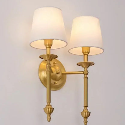 2 Appliques murales dorée
